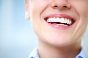 How can porcelain veneers transform one's smile