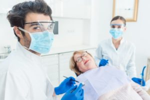 Dentist wearing PPE during appointment